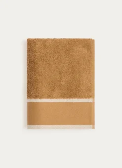SERVIETTE DE TOILETTE UNIE À LARGE BORDURE ARTHUR CARAMEL