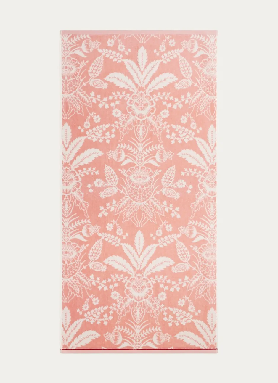 SERVIETTE INVITÉ JADE À GRANDS MOTIFS FLORAUX ROSE CLAIR