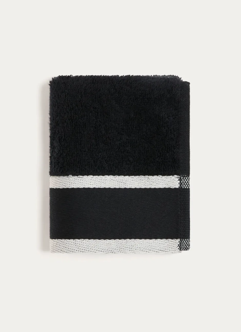 SERVIETTE INVITÉ UNIE À LARGE BORDURE ARTHUR Noir