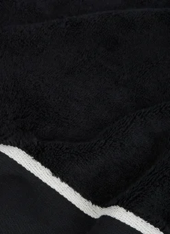 SERVIETTE INVITÉ UNIE À LARGE BORDURE ARTHUR Noir